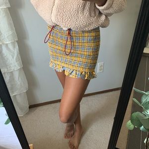 Yellow and blue plaid skirt. Flexible sizing ⬇️